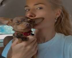 The actress has adopted a cute dog whom she often kisses to show her love.